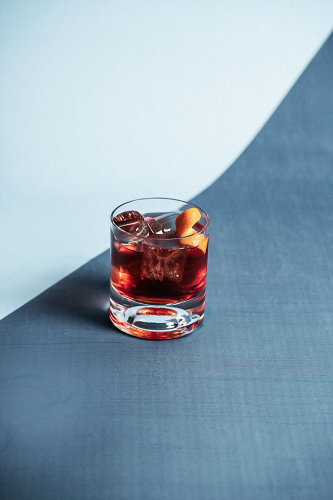 Negroni on the colored background