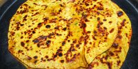Indian popular food dish Aloo Paratha in the image .selective focus
